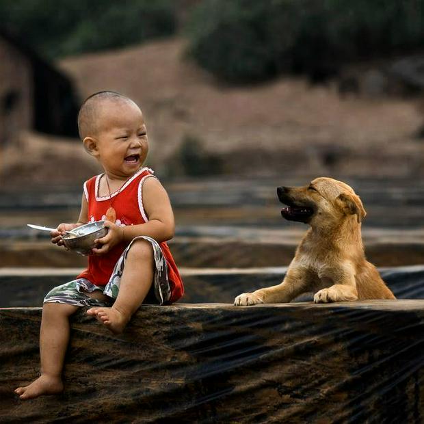 smiling-boy-with-dog-IS_0.jpg