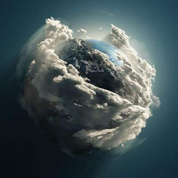 Earth-in-her-craddle-of-clouds.jpg